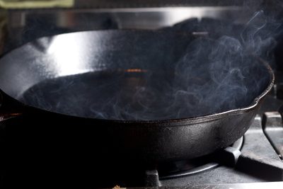 Start with a very hot, but totally dry pan. Not a drop of oil.