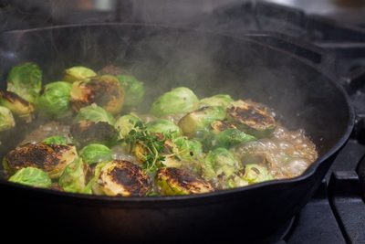Then add wine, broth, oyster sauce and herbs